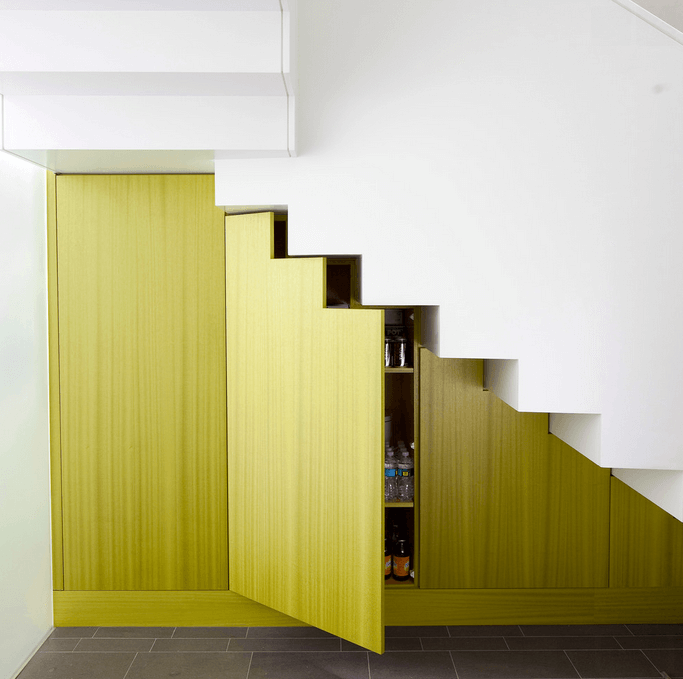 lime-green-doors-under-white-stairs-1